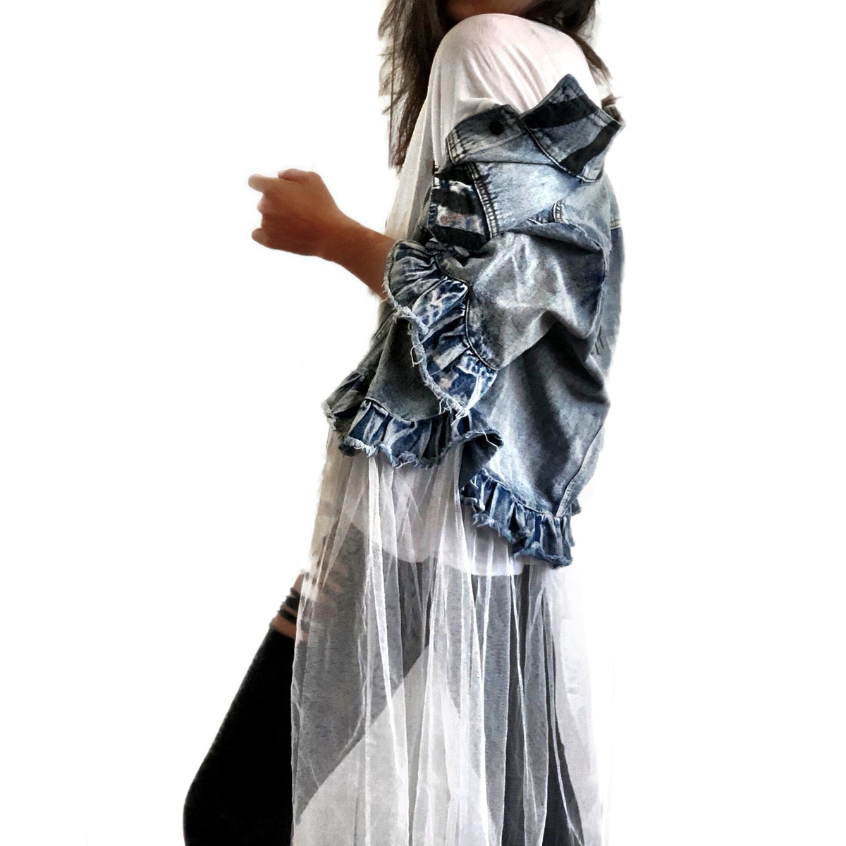 Medium blue denim short sleeve jacket with layer of long white tulle. 'But Is It Art?' painted in black on the back, with black stripes on front pockets and collar. Signed @wrenandglory.